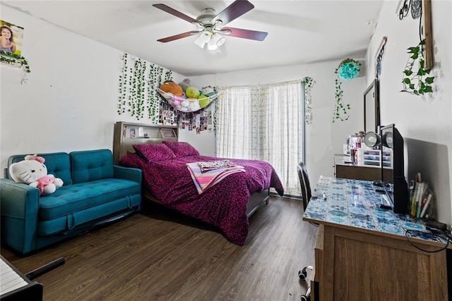 bedroom featuring ceiling fan and wood finished floors