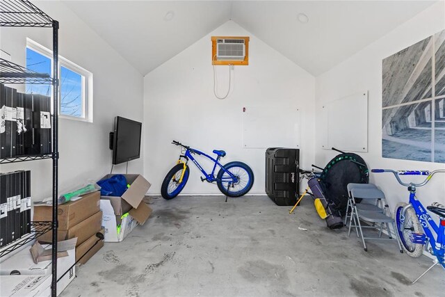 garage featuring an AC wall unit