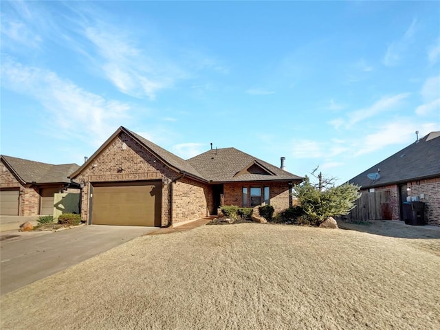 view of front of house with a garage, brick siding, driveway, and a shingled roof