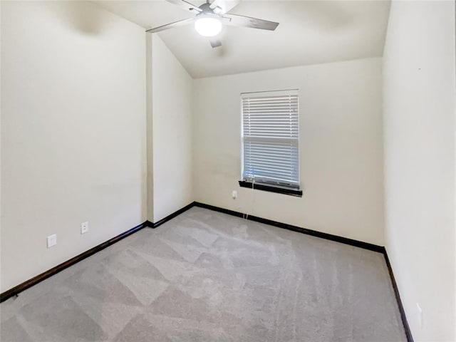 empty room with baseboards, carpet floors, and ceiling fan