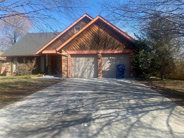 view of front of property featuring a garage and driveway