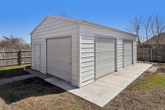 garage featuring fence