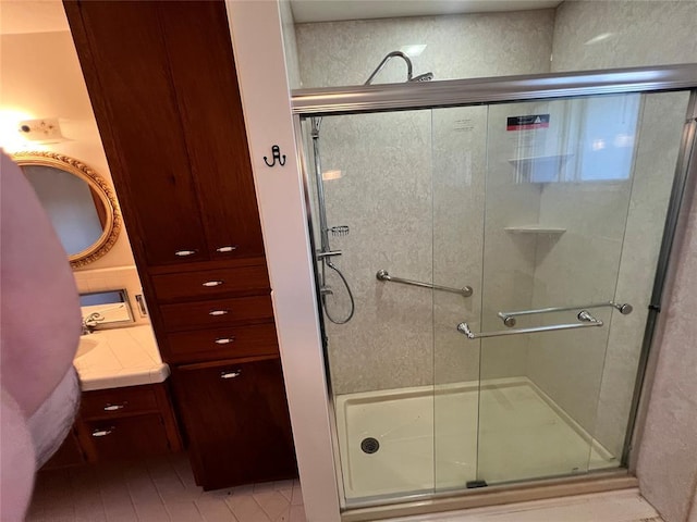 full bath featuring vanity and a stall shower