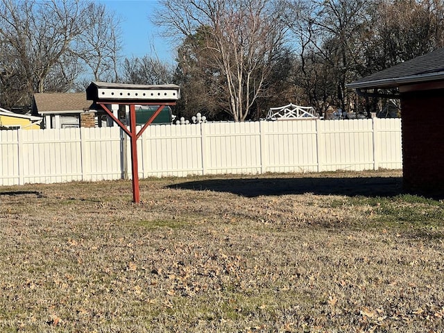 view of yard featuring fence