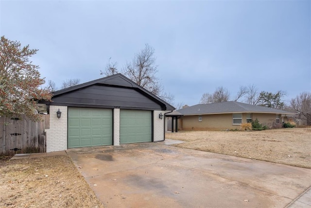 garage with fence