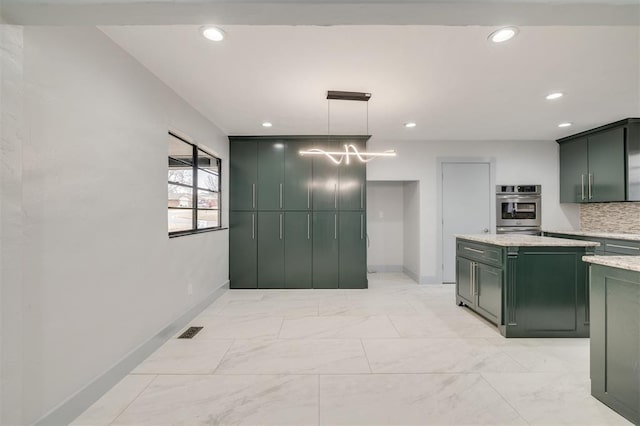 kitchen with visible vents, decorative backsplash, hanging light fixtures, green cabinets, and marble finish floor