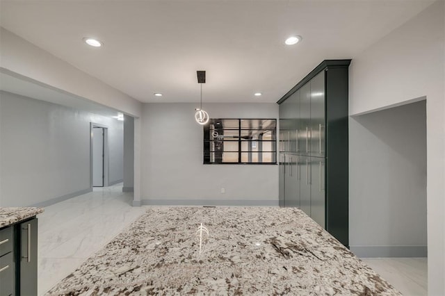 dining space featuring recessed lighting, baseboards, and marble finish floor