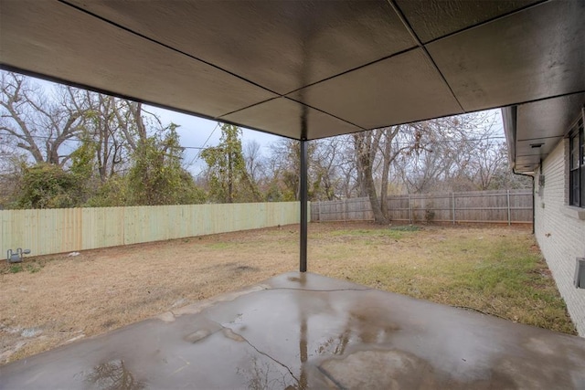 view of yard with a patio and a fenced backyard