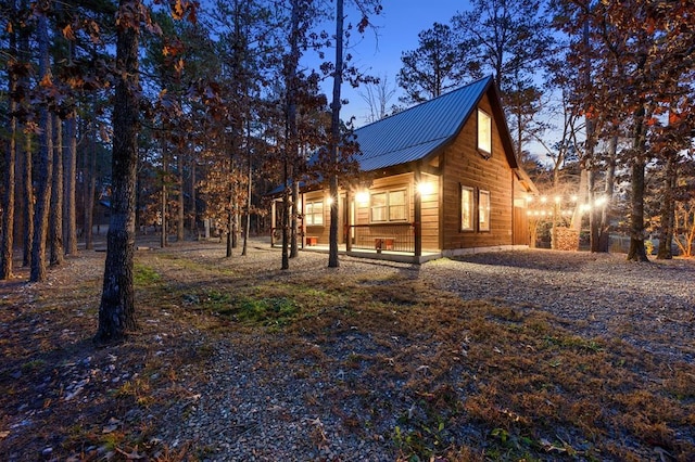 view of home's exterior featuring metal roof