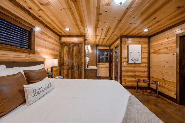 bedroom with recessed lighting, wooden walls, wooden ceiling, and finished concrete flooring