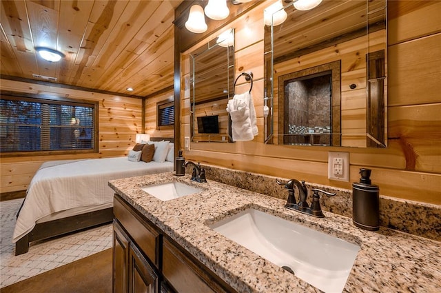full bathroom featuring double vanity, wood walls, wood ceiling, and a sink