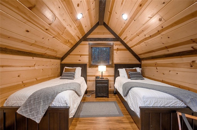 bedroom with wood walls, wood ceiling, lofted ceiling, and wood finished floors