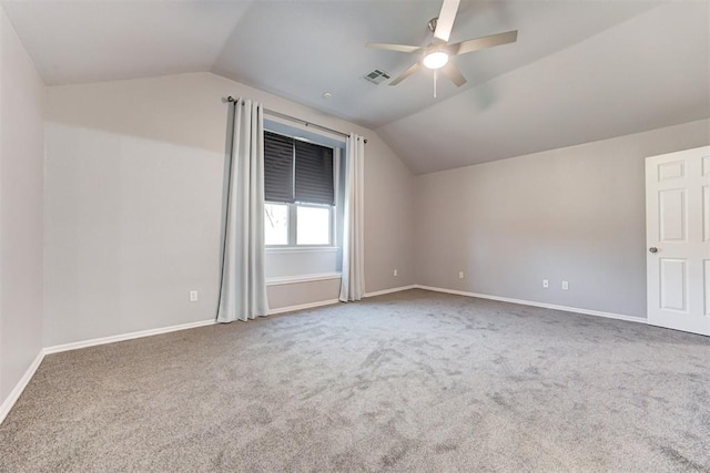 bonus room featuring lofted ceiling, carpet, visible vents, and baseboards