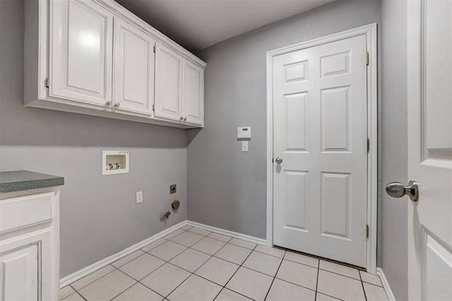 laundry room featuring cabinet space, light tile patterned floors, baseboards, hookup for an electric dryer, and hookup for a washing machine