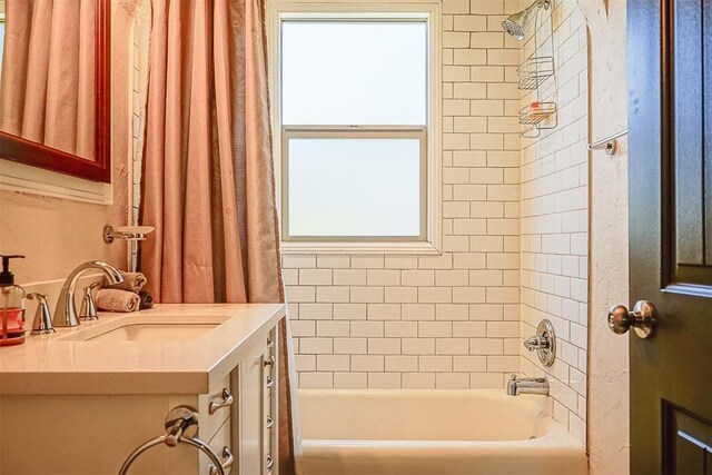 bathroom with vanity and shower / bath combination with curtain