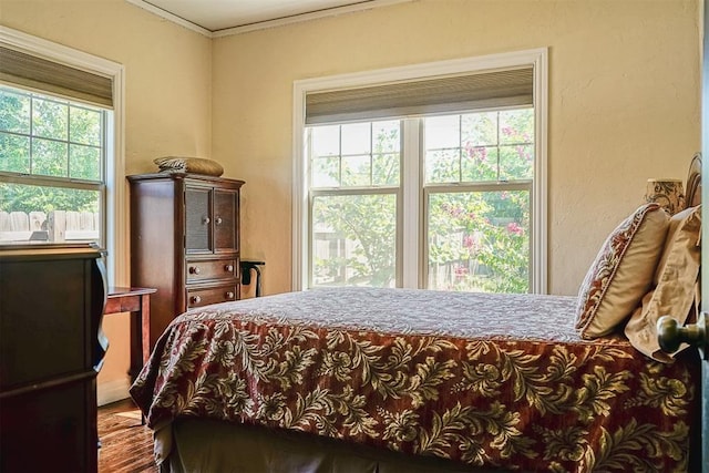 bedroom with crown molding