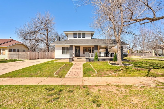 329 E 5th St, Edmond, OK 73034 - bungalow featuring a front lawn, fence, covered porch, concrete driveway, and crawl space