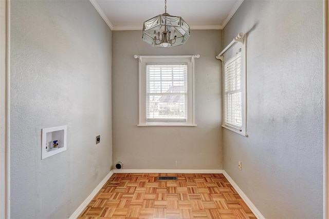 laundry room with electric dryer hookup, crown molding, baseboards, and washer hookup