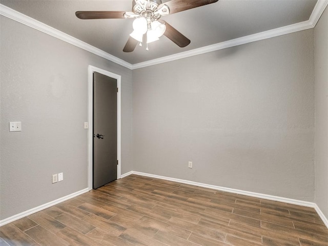 empty room with baseboards, wood finished floors, a ceiling fan, and ornamental molding