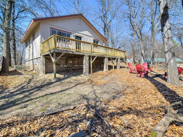 rear view of property with a deck