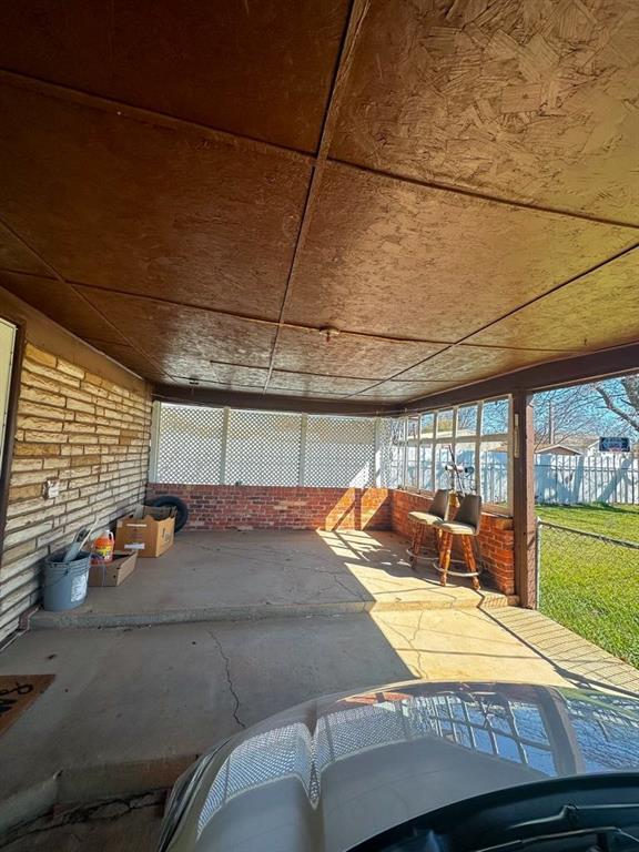 view of patio / terrace featuring fence