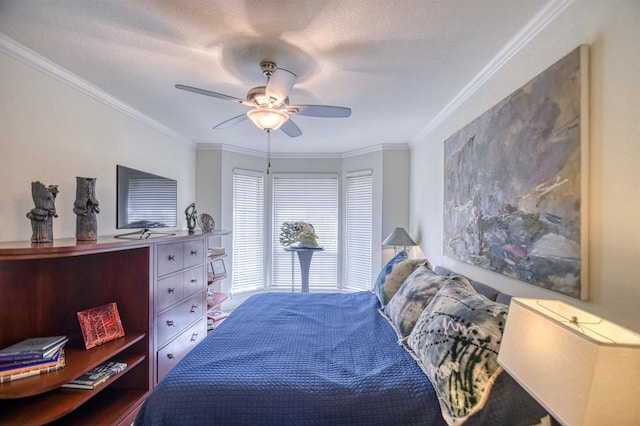 bedroom featuring crown molding, a ceiling fan, and a textured ceiling