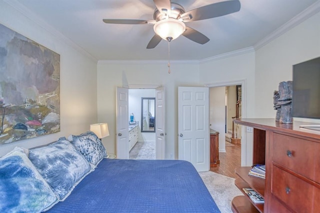 bedroom with a ceiling fan, wood finished floors, and ornamental molding