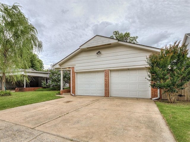 4303 N Redmond Ave, Bethany, OK 73008 - garage featuring concrete driveway