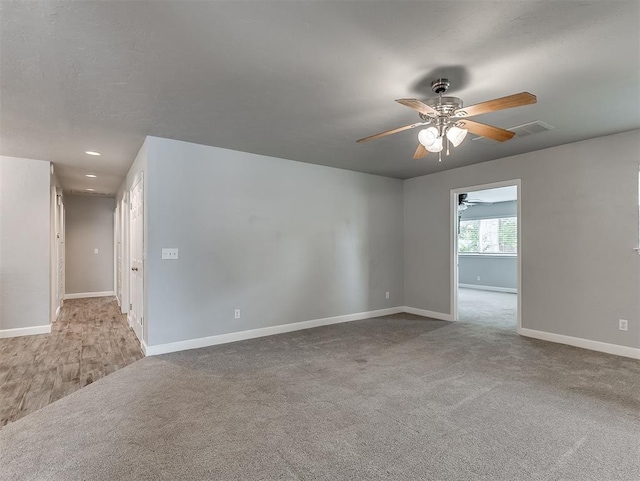 4303 N Redmond Ave, Bethany, OK 73008 - empty room with a ceiling fan, carpet floors, and recessed lighting