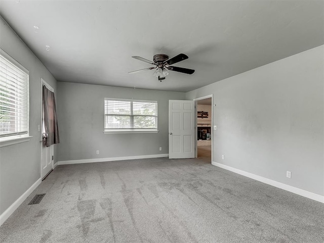 4303 N Redmond Ave, Bethany, OK 73008 - unfurnished bedroom with carpet floors and ceiling fan