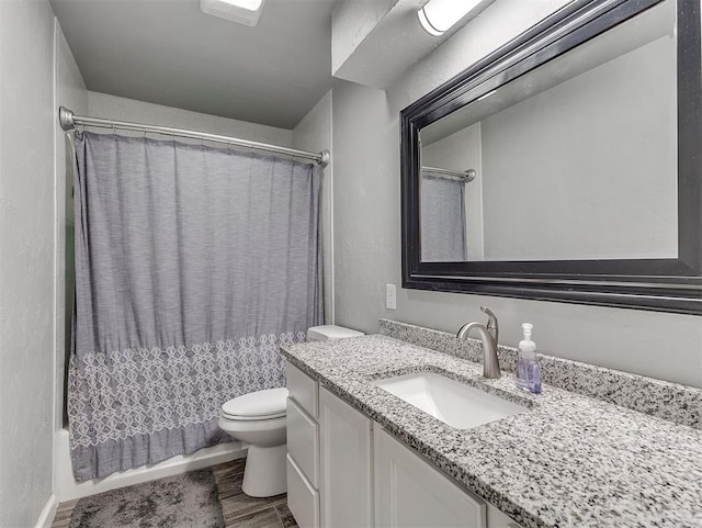 4303 N Redmond Ave, Bethany, OK 73008 - bathroom with shower / bath combination with curtain, vanity, and wood finished floors