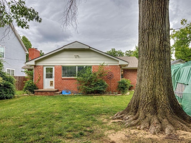 4303 N Redmond Ave, Bethany, OK 73008 - rear view of house with brick siding