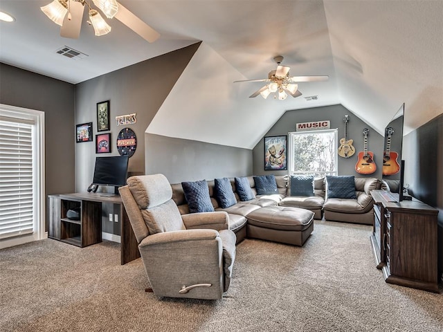 carpeted living area with visible vents, ceiling fan, and vaulted ceiling