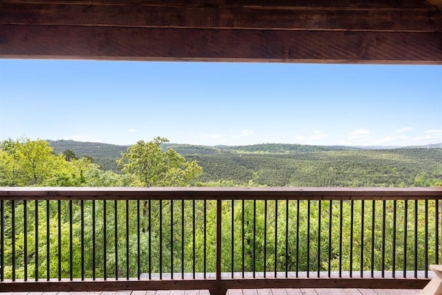 balcony with a mountain view and a forest view