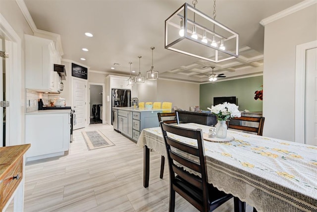 dining room with recessed lighting, coffered ceiling, crown molding, and a ceiling fan