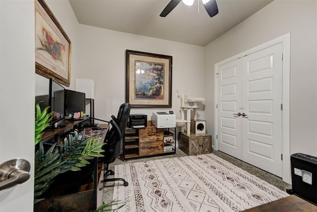 office space with a ceiling fan