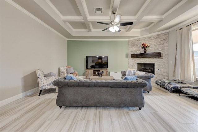 living room with visible vents, baseboards, coffered ceiling, ceiling fan, and a stone fireplace
