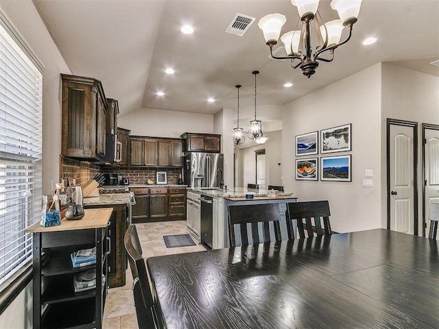 kitchen featuring visible vents, backsplash, recessed lighting, appliances with stainless steel finishes, and dark brown cabinets