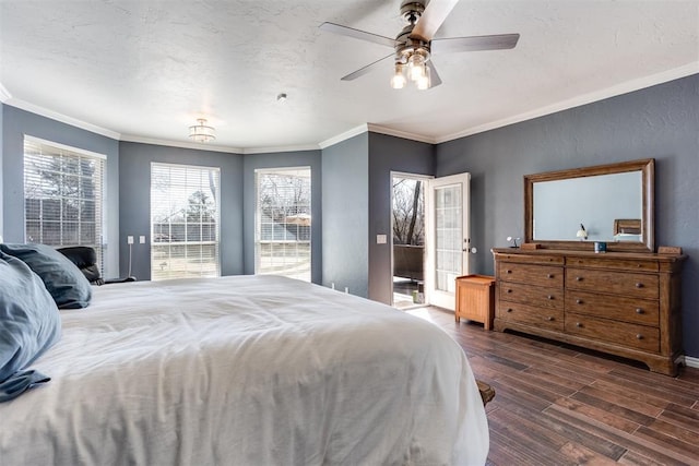 bedroom featuring access to outside, ornamental molding, and wood finished floors