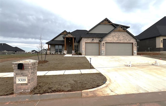 view of front of property with brick siding, an attached garage, and driveway