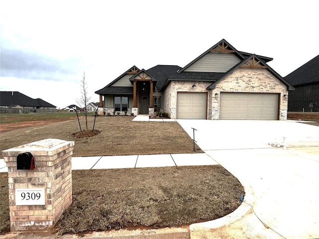 view of front of property featuring driveway and a garage