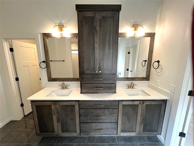 full bath with double vanity and a sink