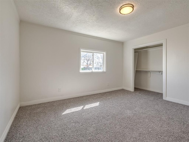 unfurnished bedroom featuring a closet, carpet flooring, and baseboards