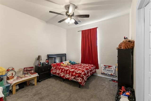 bedroom with ceiling fan, baseboards, and carpet