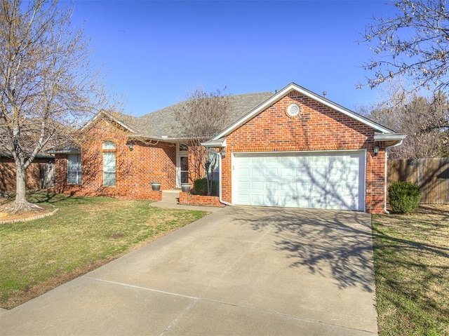 single story home with brick siding, fence, concrete driveway, a front yard, and an attached garage