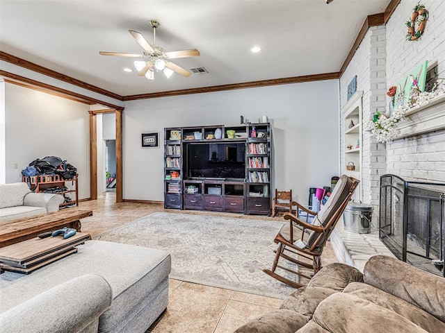 living room with baseboards, a ceiling fan, a fireplace, and crown molding