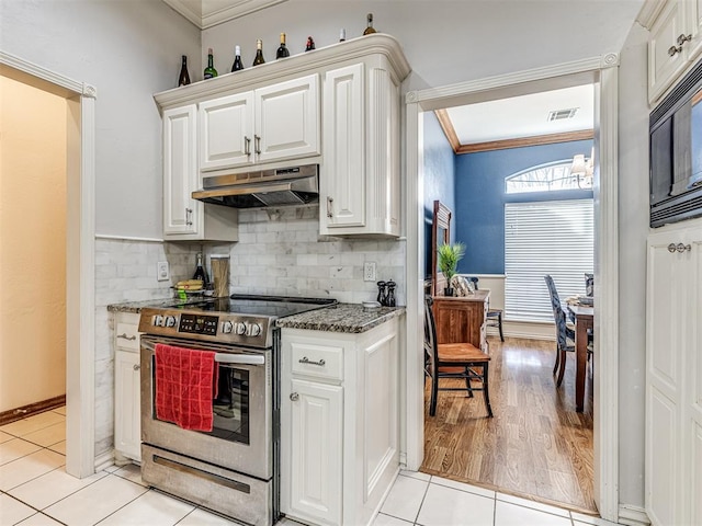 kitchen with visible vents, stainless steel electric stove, ornamental molding, under cabinet range hood, and black microwave