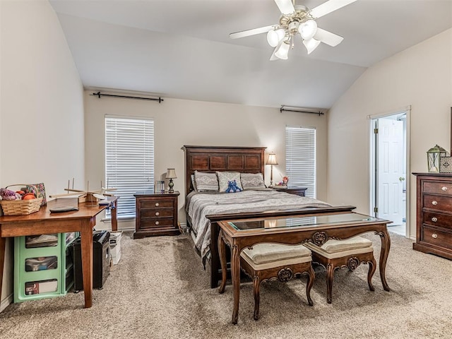 bedroom featuring lofted ceiling, light carpet, and a ceiling fan