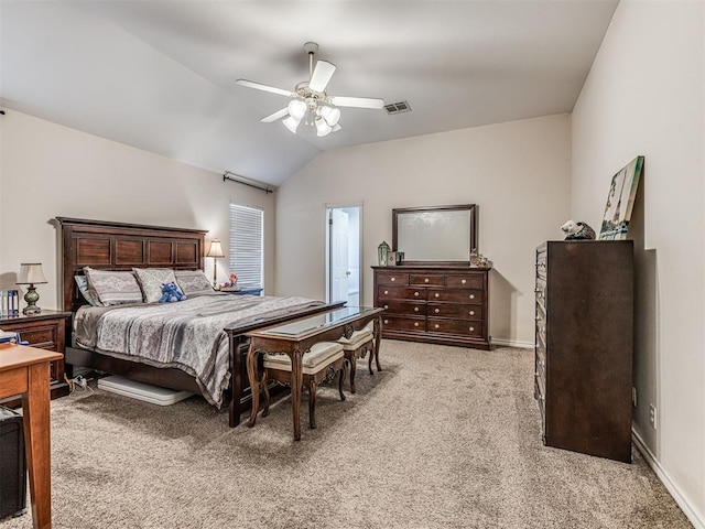 bedroom with a ceiling fan, visible vents, baseboards, lofted ceiling, and light colored carpet