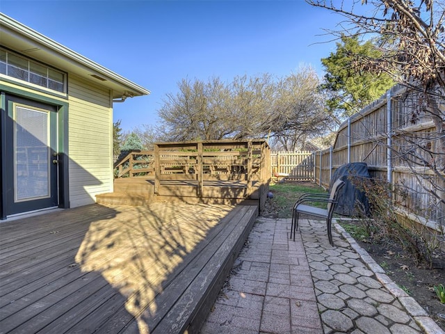 wooden deck featuring fence private yard